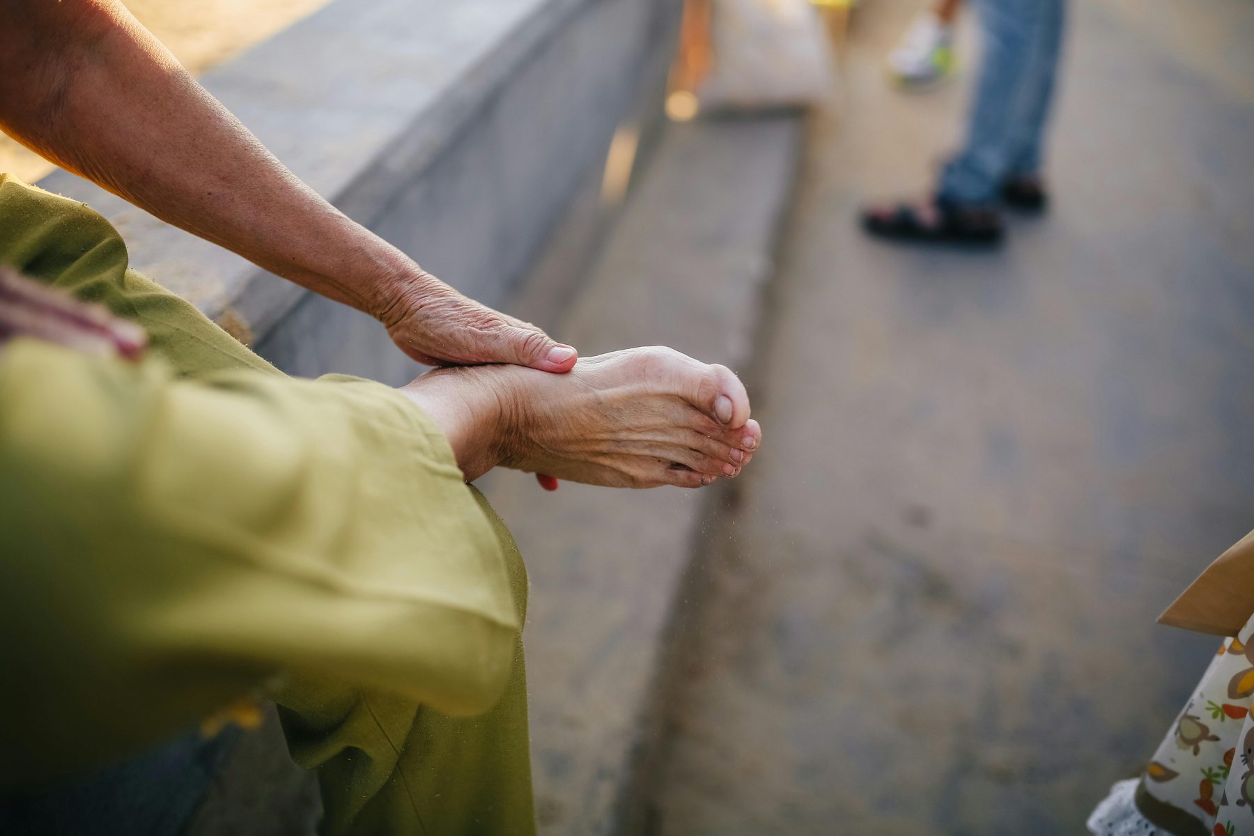Man holding heel in pain